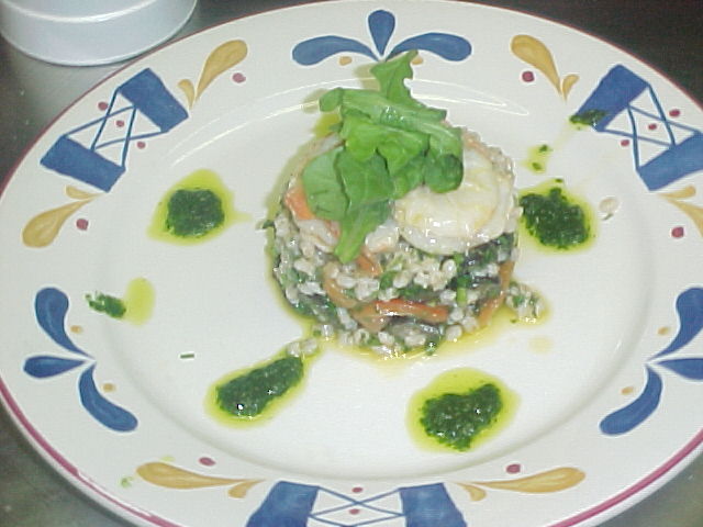 Garlic shrimp over barley salad with tomato concassé