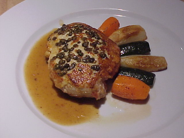 Green peppercorn crusted chicken with brandy sauce