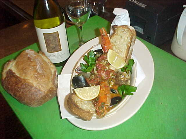 Cacciucco alla Livornese seafood stew with shellfish and grilled bread