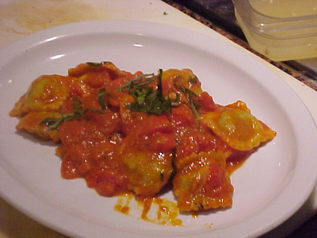 Ricotta-filled agnolotti in tomato basil sauce