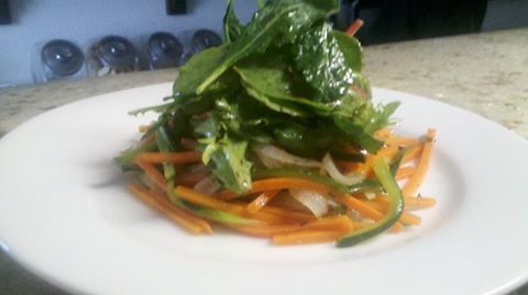 Warm steamed julienne of zucchini, carrot and daikon with baby kale