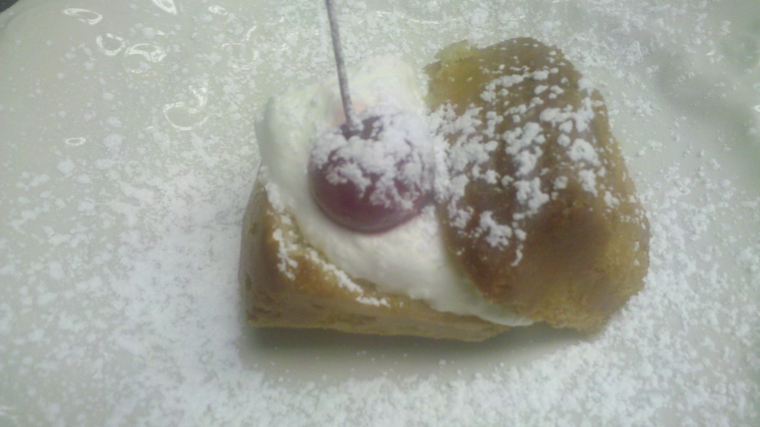 Baba al Rum with whipped cream