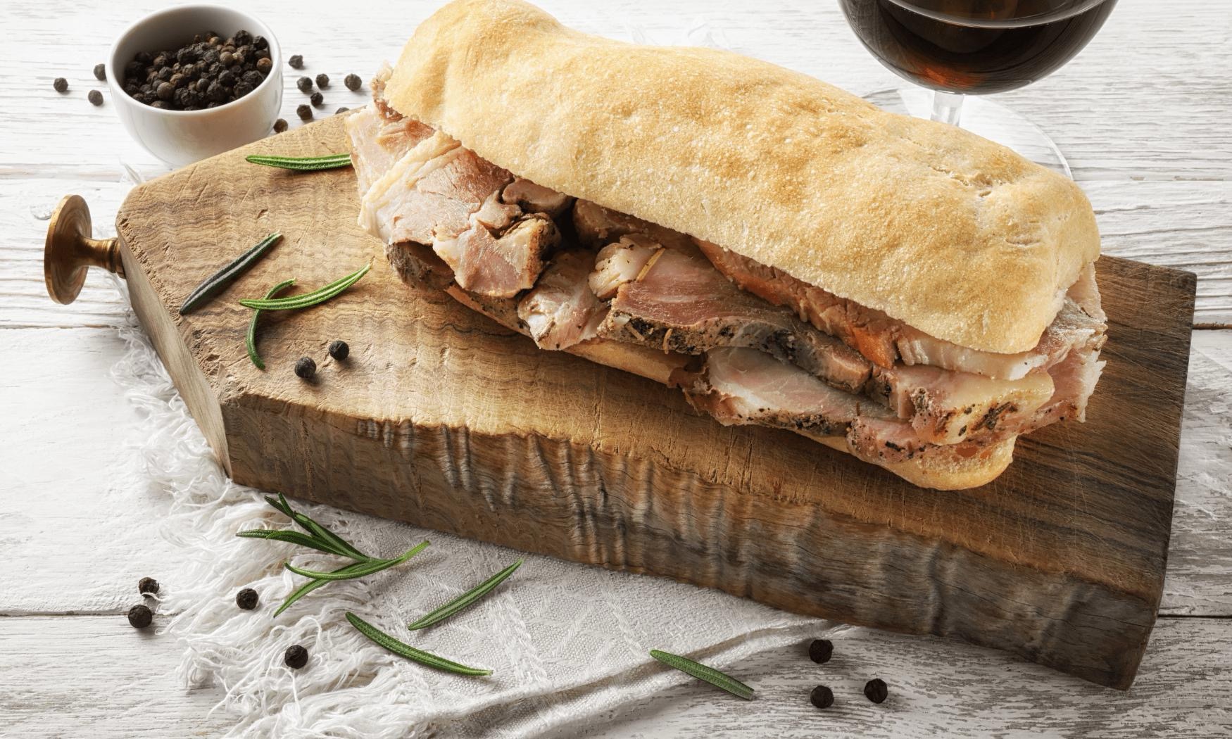 Panino con la porchetta with roasted pork shoulder and crusty bread