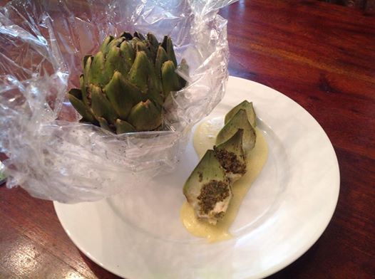 Steamed artichoke cooked in Carta Fata (magic paper)