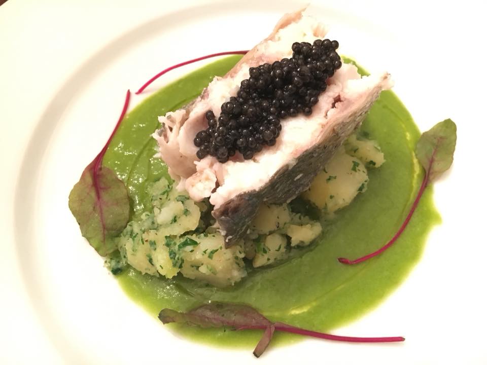 Steamed branzino with Sevruga caviar, leek vichyssoise, and parsley potatoes