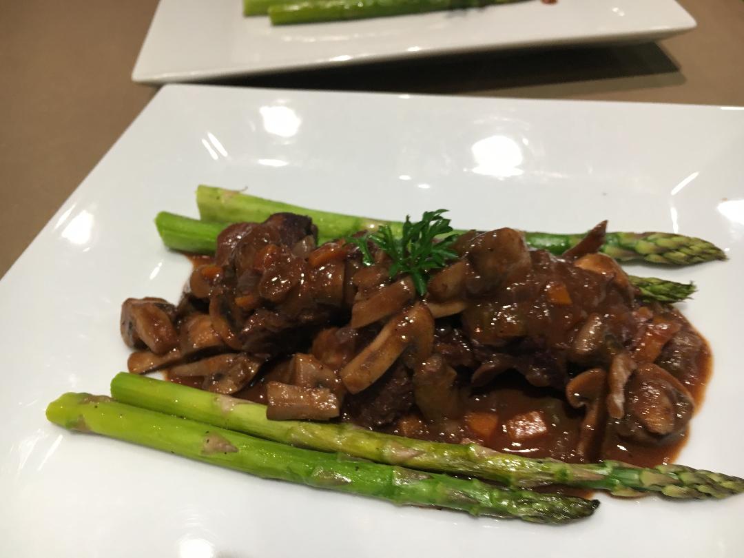 Scottiglia Tuscan beef stew slow-braised with red wine and mushrooms